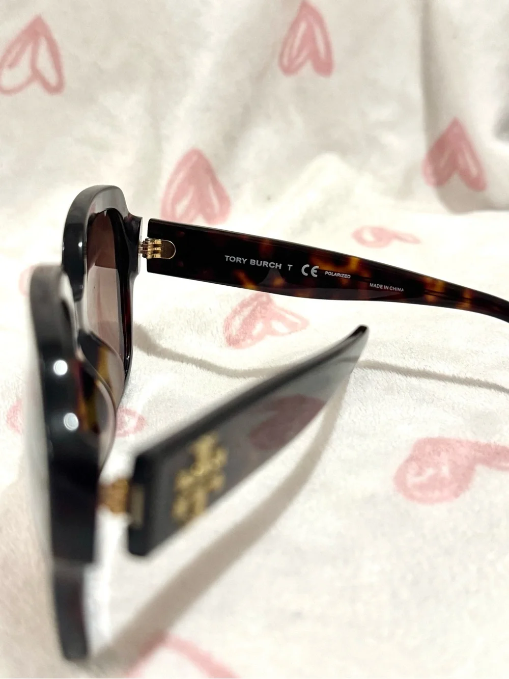 Tory Burch sunglasses with a tortoiseshell pattern
